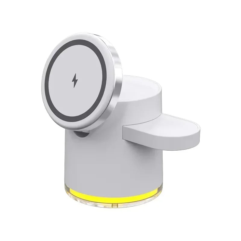 Minimalist white Qi2 magnetic wireless charging dock with cylindrical base and ambient yellow light ring, featuring dual side arms for smartwatch and earbuds charging, ThuisGemak.